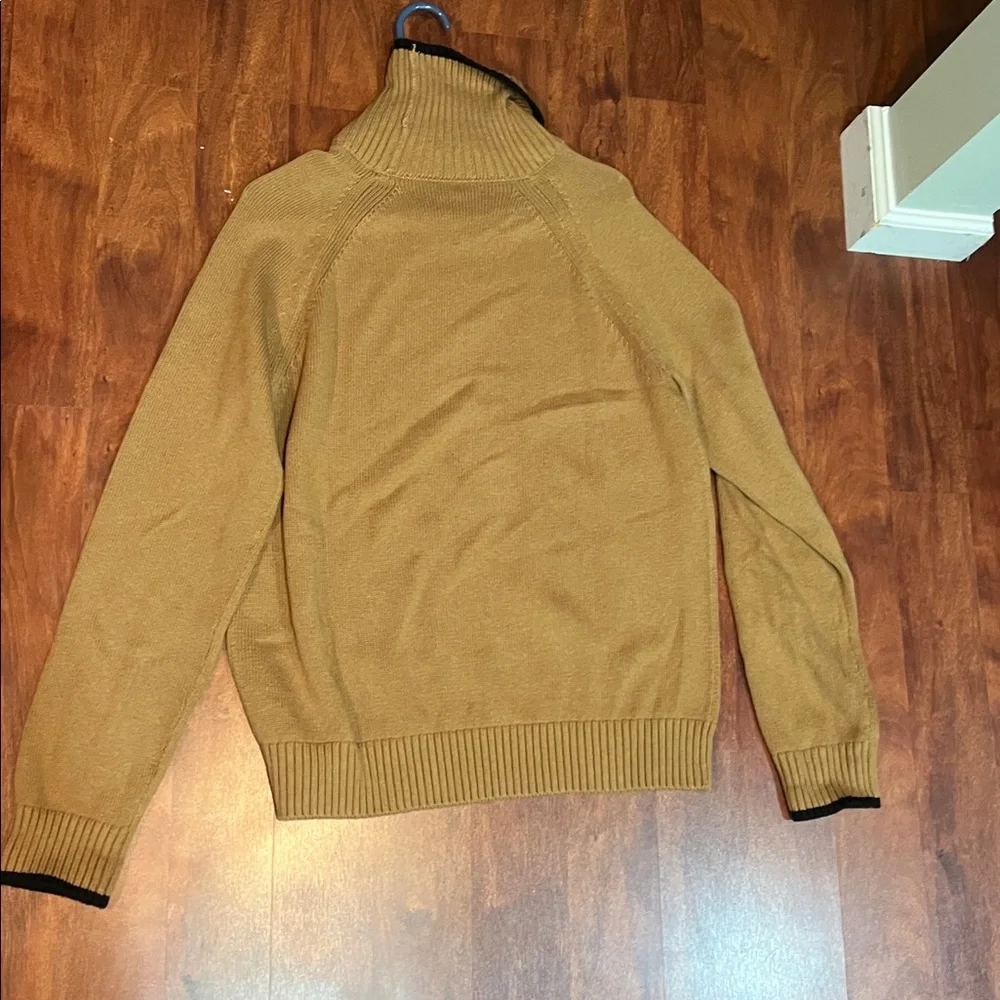 size medium banana republic tan turtle neck sweater with black details